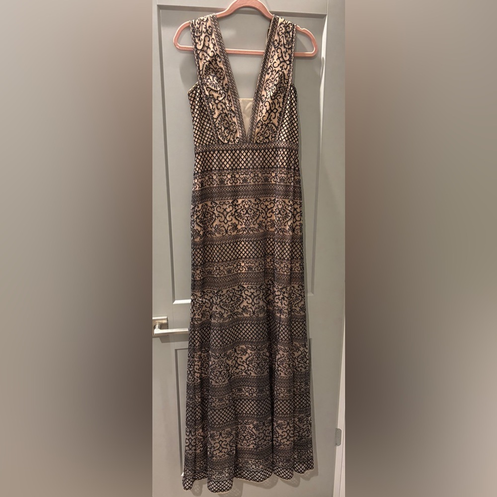 Elegant Black and Cream Patterned Dress